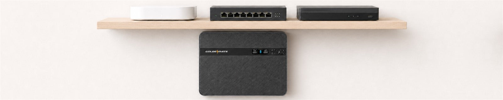 GoldenMate 1500VA wall-mount UPS installed below compact network equipment