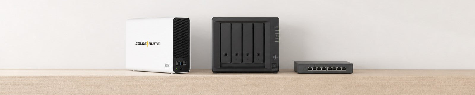 GoldenMate UPS Pro beside a four-bay NAS and network switch